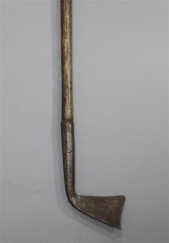 A rare 17th/18th century left handed spur toed golf club, length 42.5in.